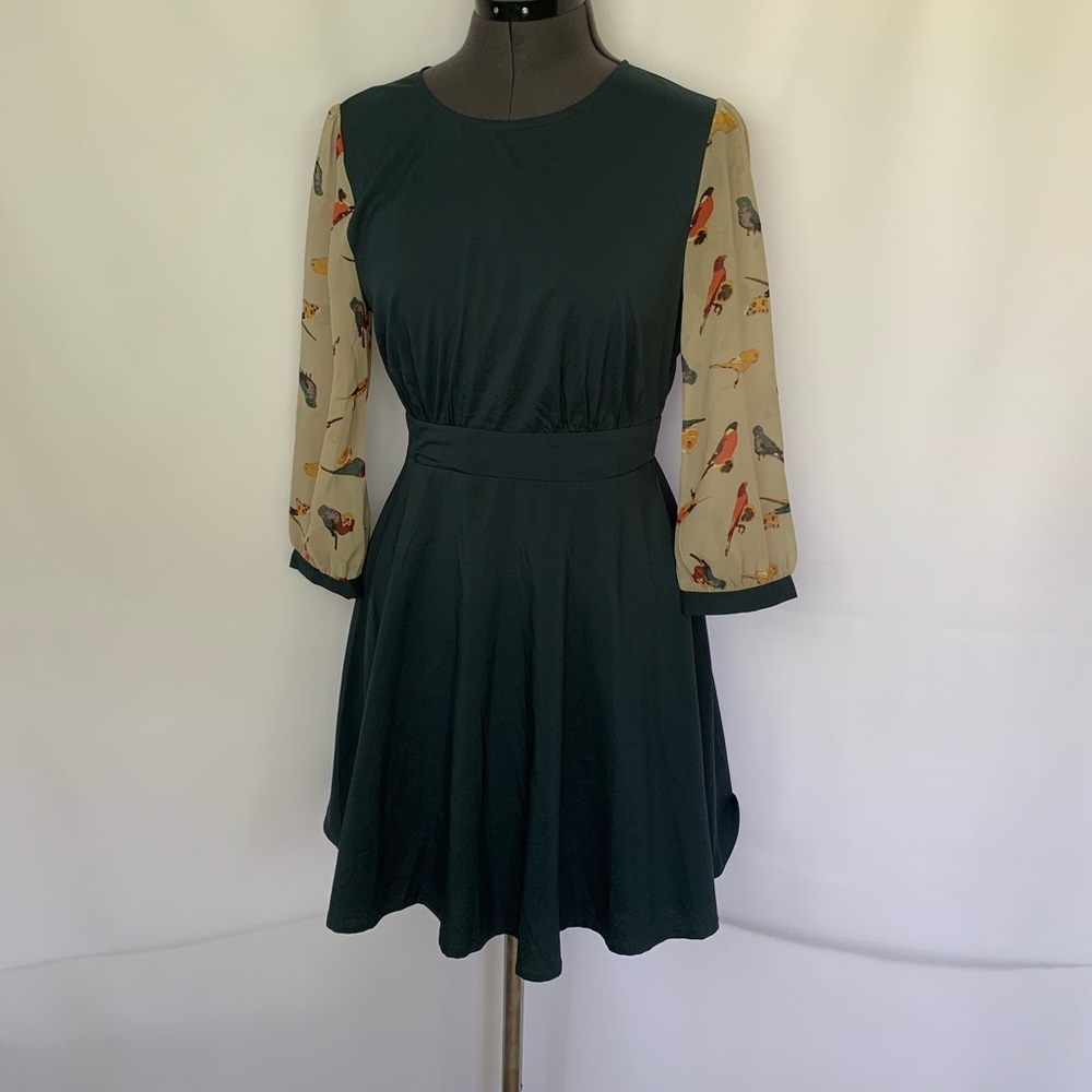 Blue dress with bird sleeves